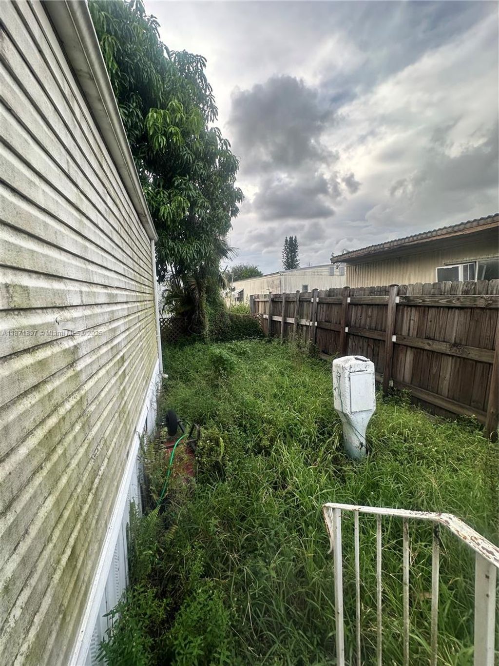 Photo of 11908 Cove Pl #B, Boca Raton, FL 33428 (MLS # A11871897)