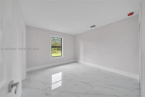 Tiny photo for 457 Woodman Dr, Lehigh Acres, FL 33972 (MLS # A12075802)