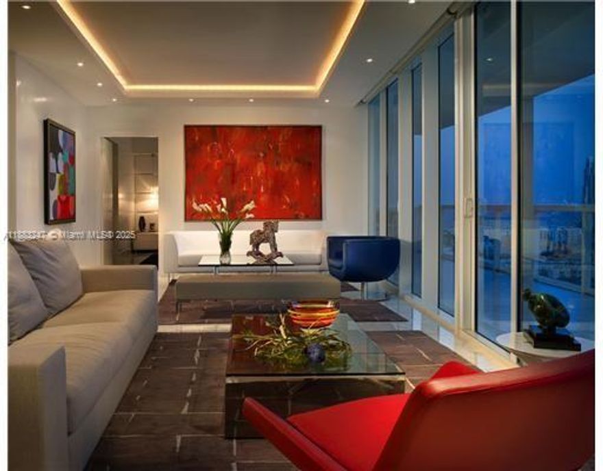 Experience luxury living at ICON South Beach in this stunning 2-bedroom, 2 bath residence on the 17th floor. Spanning over 2,100 sq. ft., this flow-through unit features floor-to-ceiling glass with sweeping views of Biscayne Bay, the Miami skyline, and the Atlantic Ocean. The open floor plan includes a spacious living area, modern kitchen with Sub-Zero & Miele appliances, and elegant marble floors. The primary suite offers a spa-like bath and generous closets, while the guest suite provides privacy and comfort. ICON is a Philippe Starck-designed masterpiece with world-class amenities including a resort-style pool deck, fitness center, spa, concierge, and on-site restaurant. Located in the sought-after South of Fifth neighborhood, just steps from the beach, marina, and fine dining.
