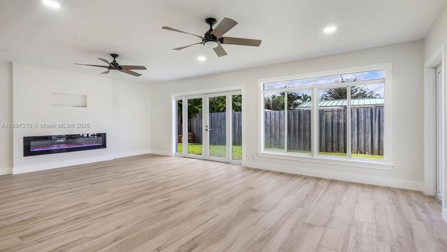 Completely Renovated With over $100k in Upgrades - 3/2 Split Bedroom Single Family Home with No HOA!! Open Concept Floor plan with a Wood-like Tile Floor Planks throughout the entire home - large Kitchen Island, Shaker Style Cabinets, Stainless Steel Appliances, Quartz Counter Tops, and Wine Cooler - Large Great Room with a Beautiful 6 Foot Recessed Fireplace and Room for a Large Wall Mount TV on Top - Beautiful and Spacious Master Suite with Walk-in Closets ($3200 Credit for Custom Closets), Small sitting room or room for a treadmill / workout space or kitchenette, Spacious Master Bath with Double Sink and a large Rainfall Shower - Covered Patio with a built-in BBQ Grill and Sink - Whole House Generator - Tankless Water heater - 3 Minutes to Pine Crest & Westminster Private Schools