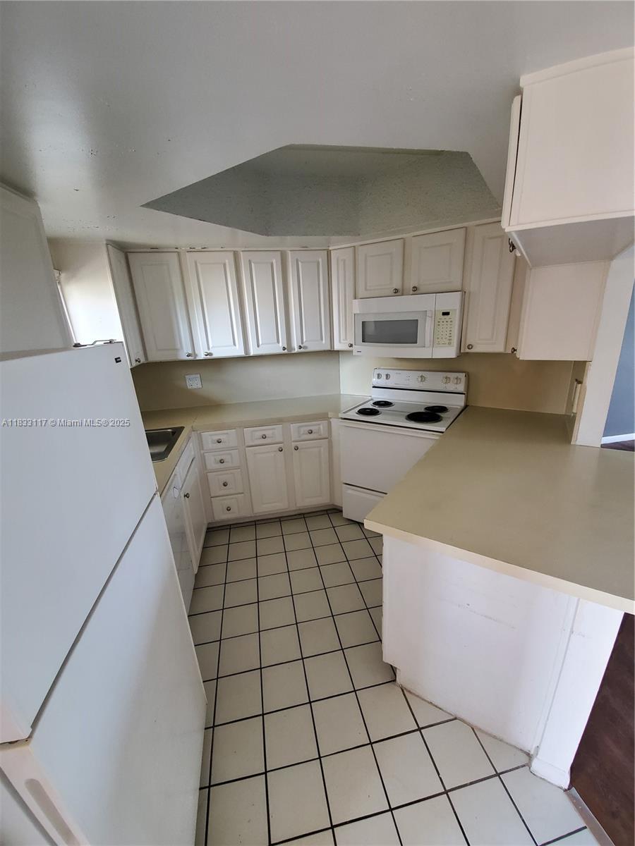 Best View in the Neighborhood. Top of the Building Unit, and plenty parking spaces. Nite and Clean Unit. Best Price in Las Vistas