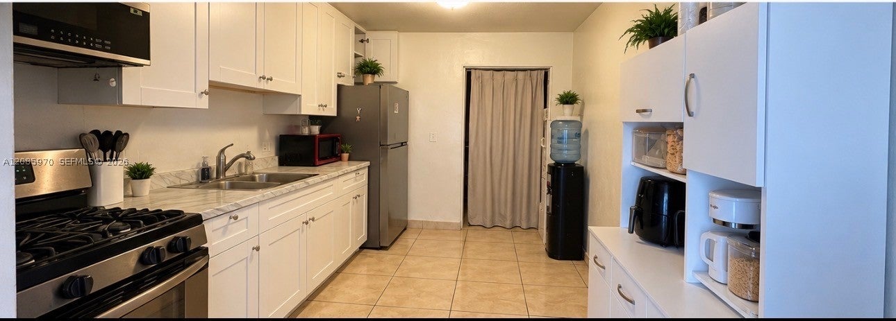 View photos, virtual tours, details... 1010 E 8th Ct