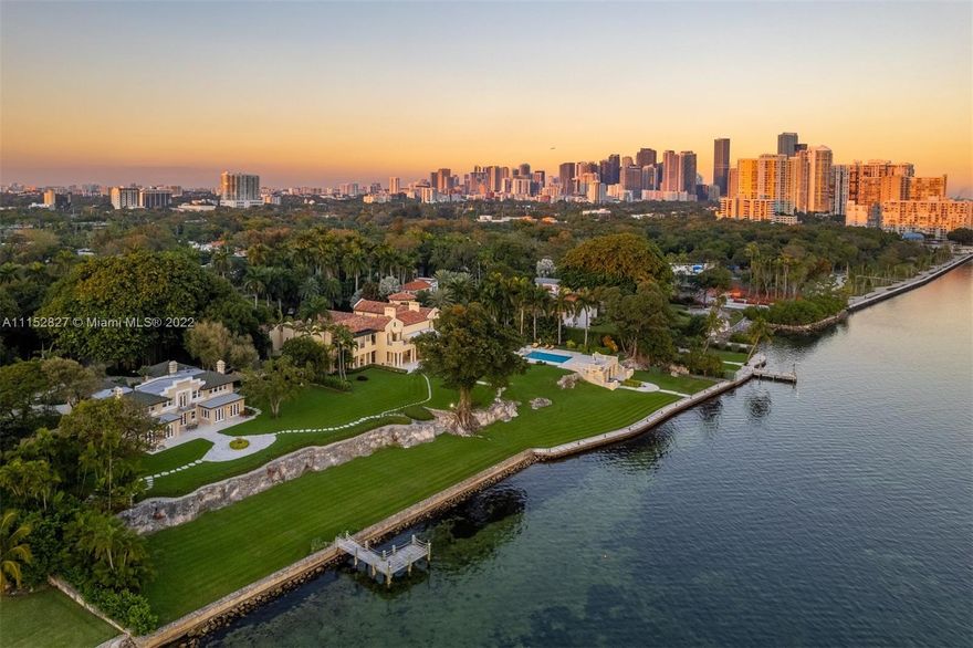 Miami’s Arsht Estate: a magnificent 4+ acre parcel directly on Biscayne Bay that is comprised of 2 homes, each w/ sweeping views of Key Biscayne, Downtown Miami, & 400’ of water.  The main residence, Indian Spring, was built in 1999 & designed for entertaining w/formal living room, Grand Salon, dining room, & Garden Room overlooking the terrace, pool, & bay.  It includes a gourmet kitchen, office, 5BR/5BA/4 ½ BA, + 2 BR/2 BA guest suite, 6-car gar & tennis court.  Villa Serena was built by W J Bryan in 1913 & has been expertly restored.  Astonishing views are captured from the living room, dining room, sitting rooms, primary BR, office, & 2nd floor BRs.  Across the lush grounds find a 2-BR guesthouse atop a 3-car gar.  This is a once in a lifetime opportunity in the heart of Miami.