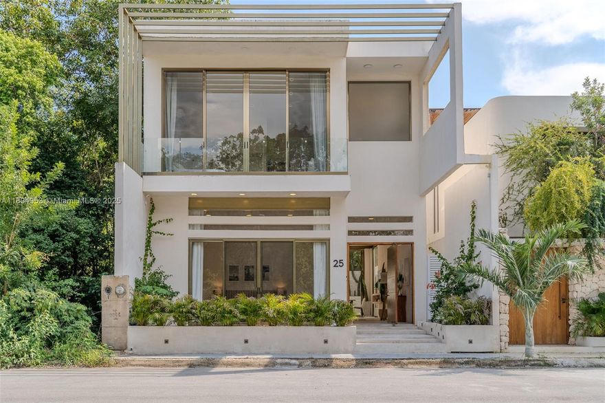 This exquisite 4-bed, 4-bath villa  located in the prestigious Riviera Tulum, gated community with 24/7 security Designed with double-height ceilings and modern furnishings, this fully furnished and equipped home is move-in ready. The open-concept living spaces seamlessly blend indoor and outdoor living, providing stunning jungle views and natural light throughout. Private pool surrounded by lush jungle greenery Spacious bedrooms, each with bathrooms. Fully furnished & equipped with contemporary decor. Pet-friendly with a dedicated dog area Gated community - security for peace of mind Access to paddle and soccer courts, jungle gym, and kids' playground Prime Location: Next to theSoriana supermarket for convenience and famous Cenote Calavera and just minutes from Tulum’s white-sand beaches