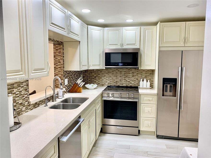 Beautifully updated 2-bedroom, 2-bath residence offering comfort, style, and peace of mind, featuring a fully upgraded kitchen and bathrooms, along with Modernised Bedrooms enhanced by recessed spot lighting. Enjoy additional living space in the Enclosed Balcony, perfect for relaxing or entertaining year-round. The property is equipped with hurricane impact windows, and the building has successfully passed its inspection and recertification, including a new roof and fresh exterior paint, ensuring long-term value and security. Residents enjoy Amenities such as a Heated Pool, clubhouse with exercise room, and sauna. Conveniently located steps from grocery stores and shopping plazas, and surrounded by a wide variety of restaurants. Just minutes from the casino and the world-renowned Aventura Mall, offering premier shopping, dining, and entertainment. A perfect combination of location, upgrades, and lifestyle