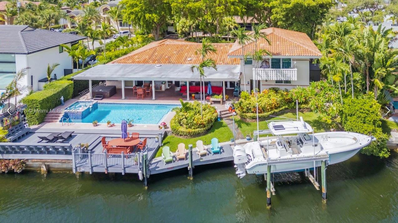 SANS SOUCI ESTATES waterfront oversized lot for a 100 foot yacht!
6 bedroom 4 1/2 bath 4500 ft.² Jacuzzi waterfall pool 3 car carport !
2025 BRAND NEW CENTER ISLAND ITALIAN DESIGNER KITCHEN WITH "SUBZERO WOLF APPLIANCES,
Gorgeous tropical ranch design spread out to entertain 105 feet on the water +15,000 pound Boatlift Owner will finance W/30% Down Great price for an oversize lot with a two-story modern house only 4.2 mil
PHOTOS COMING SOON VIRTUAL TOUR EMAILED UPON REQUEST NEW KITCHEN INSTALLED IN 2 WEEKS
