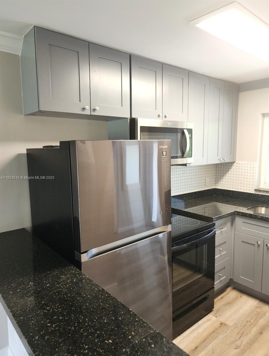 Beautifully Renovated 2/2 Apartment in the Heart of West Boca Raton This stunning 2-bedroom, 2-bath apartment has everything you need! Recently remodeled, it features modern laminate flooring throughout, fresh paint, granite countertops, and sleek stainless steel appliances. The space is bright, airy, and generously sized, offering plenty of natural light and ample storage. Ideally located close to shopping, dining, and major roads—convenience and comfort all in one place! This is all ages community, families are welcome!