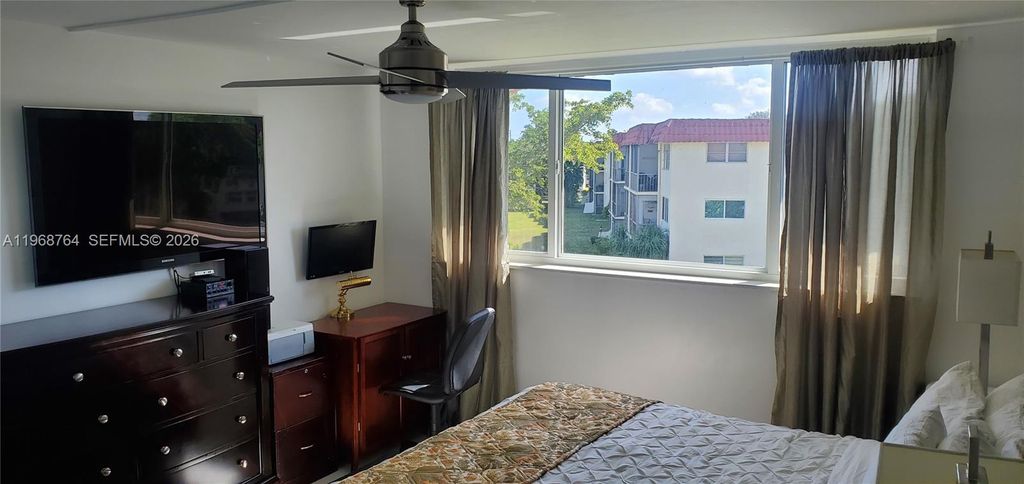 Photo of 9720 S Hollybrook Lake Dr #303, Pembroke Pines, FL 33025 (MLS # A11968764)