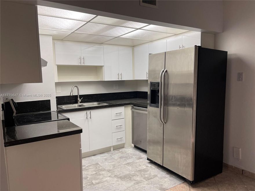 Great 1/1 on first floor. Just updated kitchen, new bathroom, new bedroom laminated floor, just painted. Washer/dryer in the unit. Very convenient parking spot on the side of the unit. Community pool. Great for investors, can be rented right away. Unit is rented until 08/2026