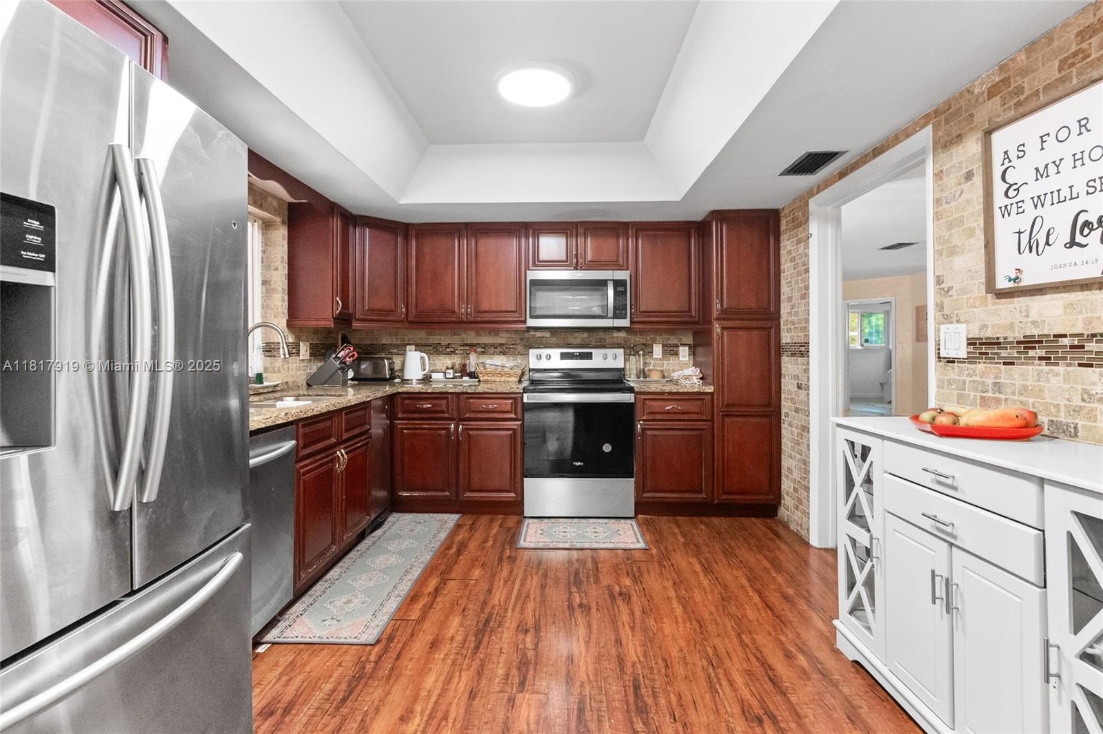 Located in the heart of historic and highly desirable Plantation Gardens, this 4-bed, 3-full bath pool home sits on a corner lot just shy of 1/3 acre. Expansive circular driveway and 2-car garage offer ample parking, and plenty of room for your boat, RV, and toys. Split floor plan w/4 LARGE BRS. Updates to kitchen with SS appliances & granite countertop, primary bath, guest bath, impact windows and 1 door, HVAC, pool marcite, and pool pump. New roof. Step outside to a beautiful private backyard with fruit trees, new fence providing added privacy, and sparkling pool—perfect for relaxing or entertaining. Enjoy the serenity of the quiet, tree-lined street, while being near shopping, dining, and Turnpike access. No HOA! Don't miss your chance to call this wonderful property your new home!