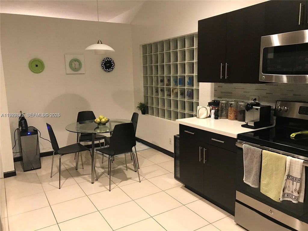Photo of 4729 NW 120th Dr #4729, Coral Springs, FL 33076 (MLS # A11923872)