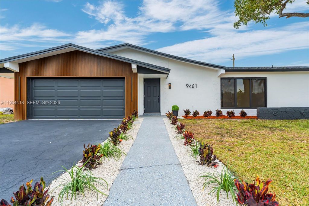 Photo of 9461 NW 19th Pl, Sunrise, FL 33322 (MLS # A11964418)