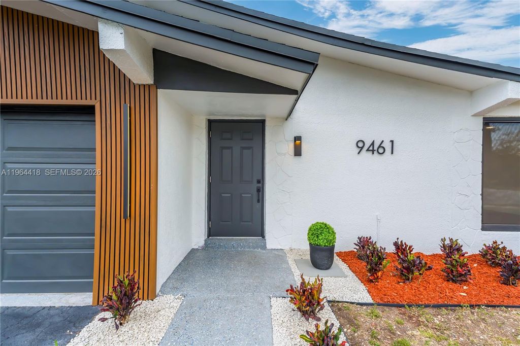 Photo of 9461 NW 19th Pl, Sunrise, FL 33322 (MLS # A11964418)