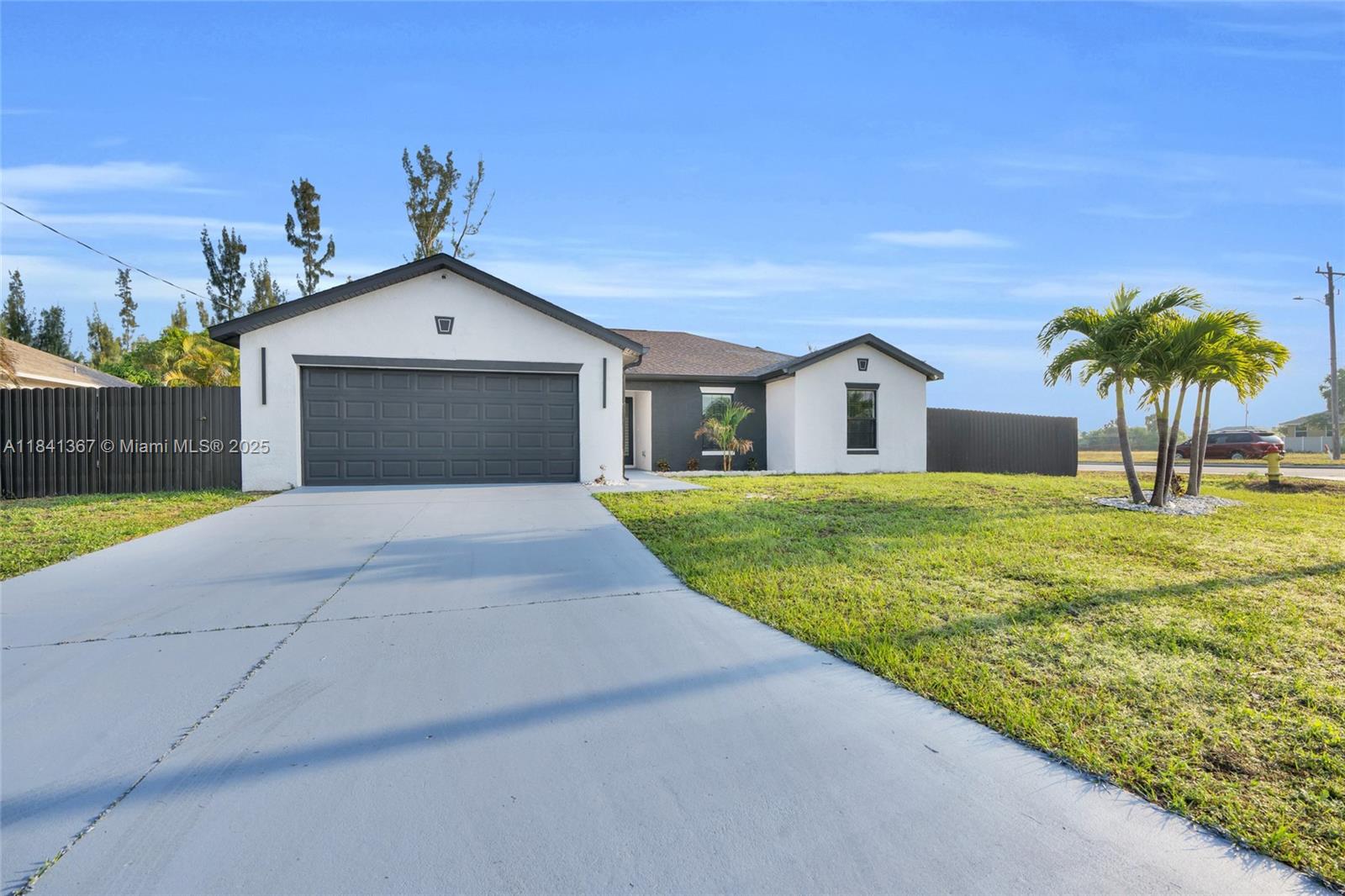 MOTIVATED SELLER! BRING ALL OFFERS! Discover the potential in this hidden gem! Situated on a spacious 0.32-acre corner lot, this 1,522 sq ft home features 3 bedrooms and 2 bathrooms, all under air. The fully fenced yard provides privacy and security, perfect for families or pets. Inside, you’ll find granite countertops, brand-new stainless-steel appliances, and modern finishes throughout. Additional upgrades include a new hurricane-impact garage door and storm shutters for peace of mind. The backyard boasts a large concrete slab—ideal for entertaining, outdoor living, or future expansion—and there’s plenty of space to add a pool. Don’t miss this opportunity in a desirable location with endless possibilities. Schedule your showing today!