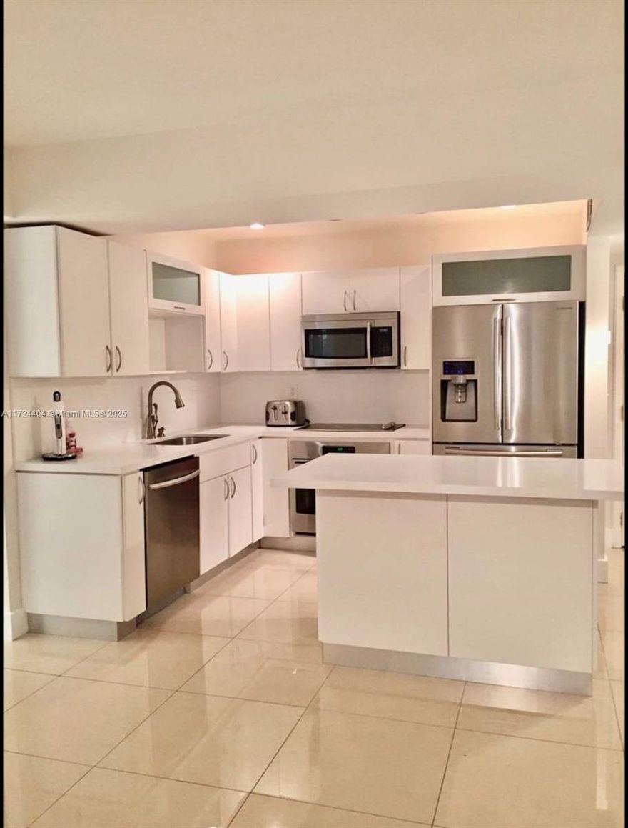 WELCOME TO THE OLYMPUS TOWER! GREAT LOCATION ON THREE ISLANDS! PRIVATE COMMUNITY WITH BEAUTIFUL GROUNDS, SPACIOUS APARTMENT REMODELED WITH 2 BEDROOM AND 2 BATH PLUS BIG DEN THAT YOU CAN USE LIKE OTHER BEDROOM OR LIKE OFFICE, BIG WALK-ING CLOSET, ITALIAN OPEN KITCHEN,QUARTZ COUNTER TOP,S/S APPLIANCES,GREAT AMENITIES INCLUDE MARINA, GYM, TENNIS COURTS, HEATED POOLS, BILLIARDS, PICNIC AREA,OLYMPIC POOL,VALET, 24 HR. SECURITY, COURTESY BUS, GAS GRILLS, AND COVERED PARKING. WALKING DISTANCE TO THE BEACH, RESTAURANTS,SUPERMARKETS CASINO, PHARMACY AND SHOPPING.