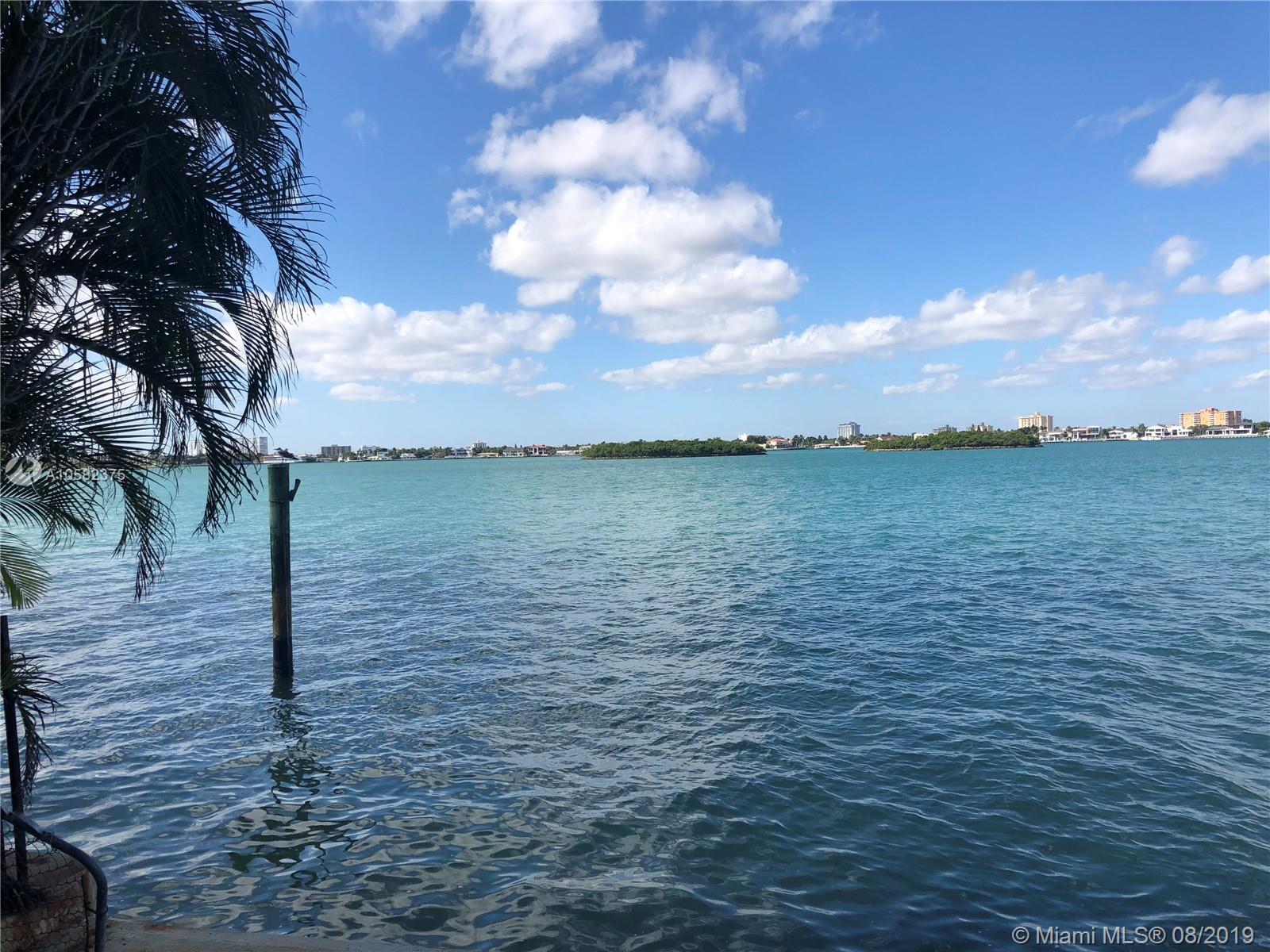 Enjoy breathtaking views in sought after Bay Harbor Islands. Fabulous opportunity to build on 112 feet of wide open bay. Large 20,000 square foot lot perfect for a developer or buyer who wants to build their own estate in a private oasis. Steps from A+ schools, great restaurants, and the world renowned Bal Harbour shops.