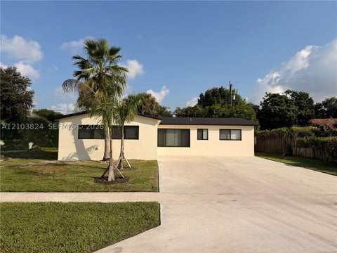 Photo of 6211 NW 16th Ct, Sunrise, FL 33313 (MLS # A12103824)