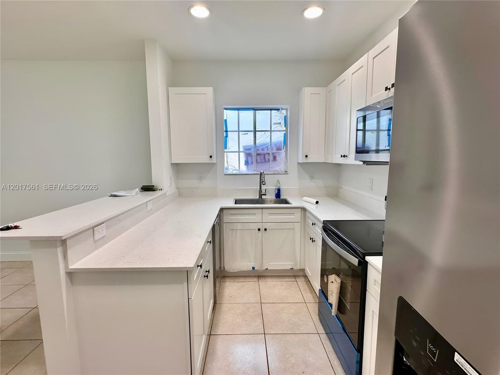 Photo of 2301 Wilson St #A, Hollywood, FL 33020 (MLS # A12017561)