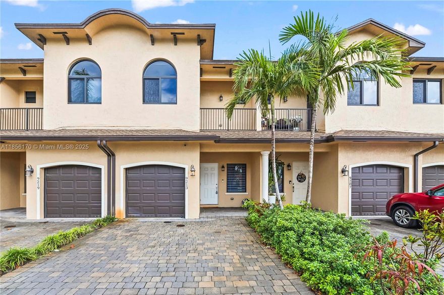 Welcome to Deer Lake — where 2020 construction meets modern style in the heart of Pembroke Pines. Assumable 2.75% VA loan available to any qualified buyer! This light-filled townhome impresses with crisp curb appeal, paver driveway, and a covered entry leading to an open layout with soaring ceilings and elegant finishes. The granite-topped kitchen features stainless steel appliances, rich cabinetry, and generous prep space for cooking or entertaining. Upstairs, the primary suite offers a private balcony, walk-in closet, and gorgeous tiled shower. Two additional bedrooms, a full bath, and a versatile loft complete the upper level. Enjoy a main-floor half bath, laundry room, and garage access. Lot size 2554 sq ft — a perfect blend of comfort, convenience, and community.