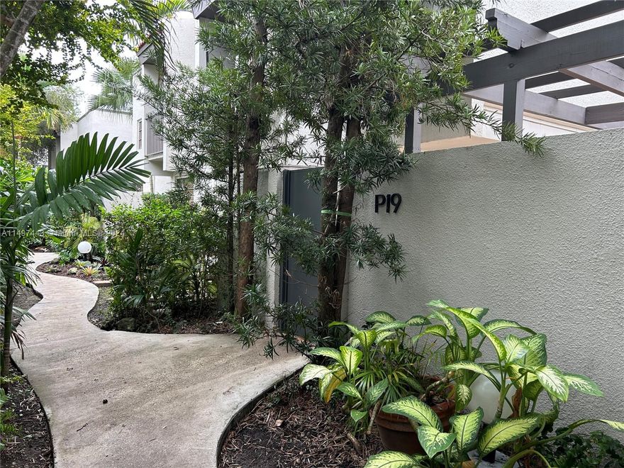 Perfectly spacious townhome with private lanai with 2 assigned parking spaces located at Oasis, a gated community with 2 pools and dog park. This 2 bedrooms, 2 bathrooms home immediately charms with verdant landscaping, large living room, and spacious kitchen featuring ample cabinetry, and adjoining dining area. Enjoy early morning coffee on the private lanai, or catch some rest in the sizeable primary bedroom boasting an en suite. One additional bedroom is generously sized with a dedicated closet. A+ elementary and middle school district. Living here, you'll be close to the Coral Gables Country Club, the University of Miami, Tropical Park & Barnes Park, the thriving heart of South miami, Palmetto Expy, close to Miracle Mile and shops at Merrick Park.