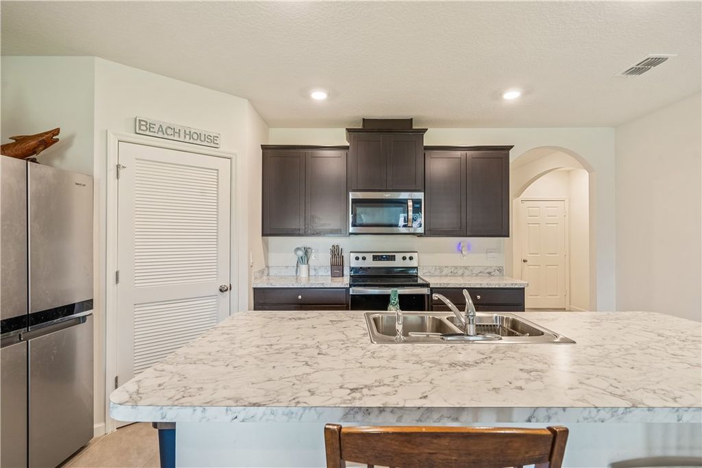Photo of 471 Midvale Terrace, Sebastian, FL 32958 (MLS # 289051)