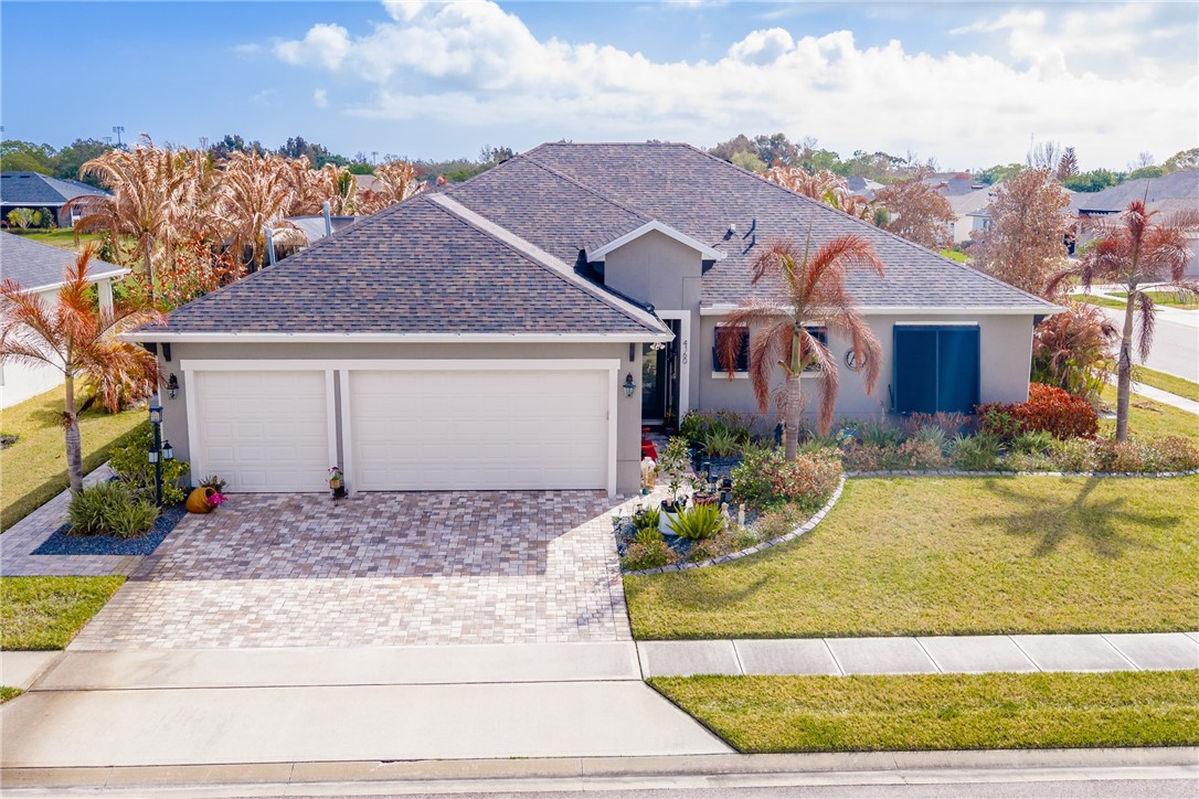 View of front of house featuring a garage, a front