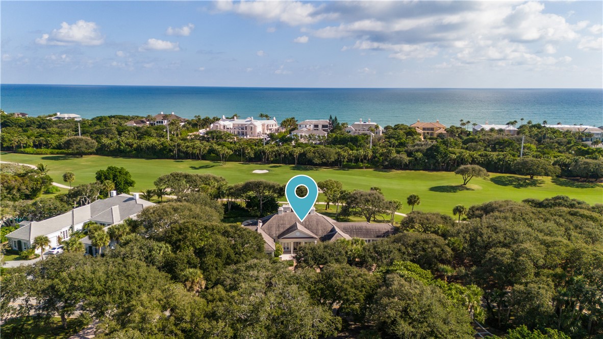 Aerial view of a local golf course and a large bod