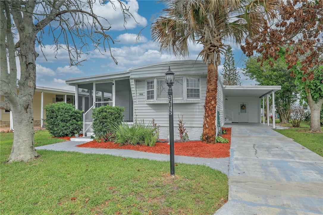 Photo 1 of 36 — 906 Wren Circle, Barefoot Bay, FL 32976