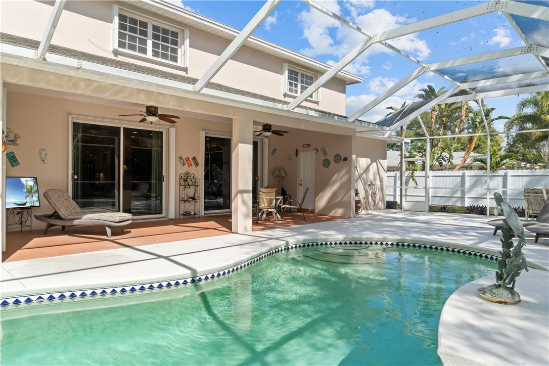 Covered porch and screened saltwater pool