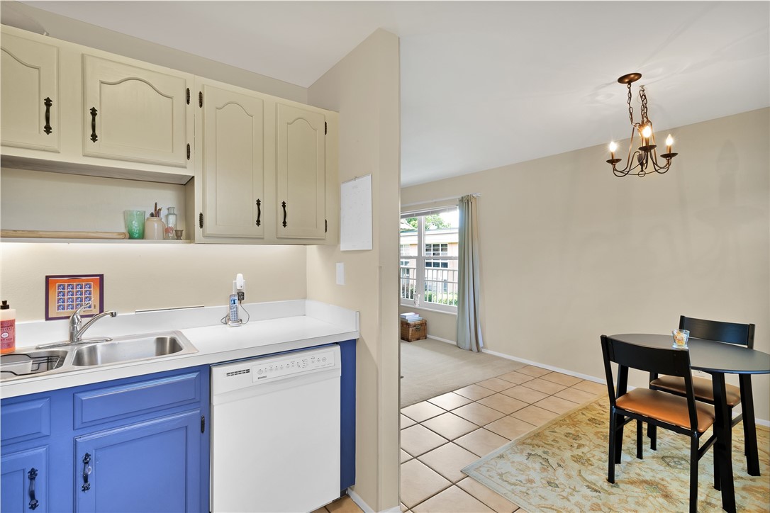Kitchen featuring a stainless steel double sink, w