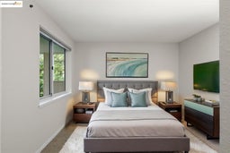 Bedroom with carpet and baseboards