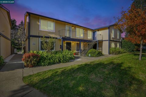 Photo of 1520 Schenone Ct #7, Concord, CA 94521 (MLS # 41118617)