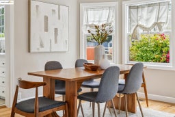 Dining room featuring light wood-style floors and baseboards