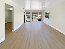 Spare room featuring light wood-style flooring and recessed lighting
