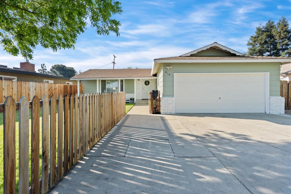 Photo of 816 Bowen Avenue, Modesto, CA 95350 (MLS # ML82040867)