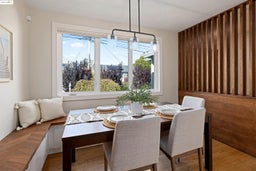 Dining area featuring wood finished floors