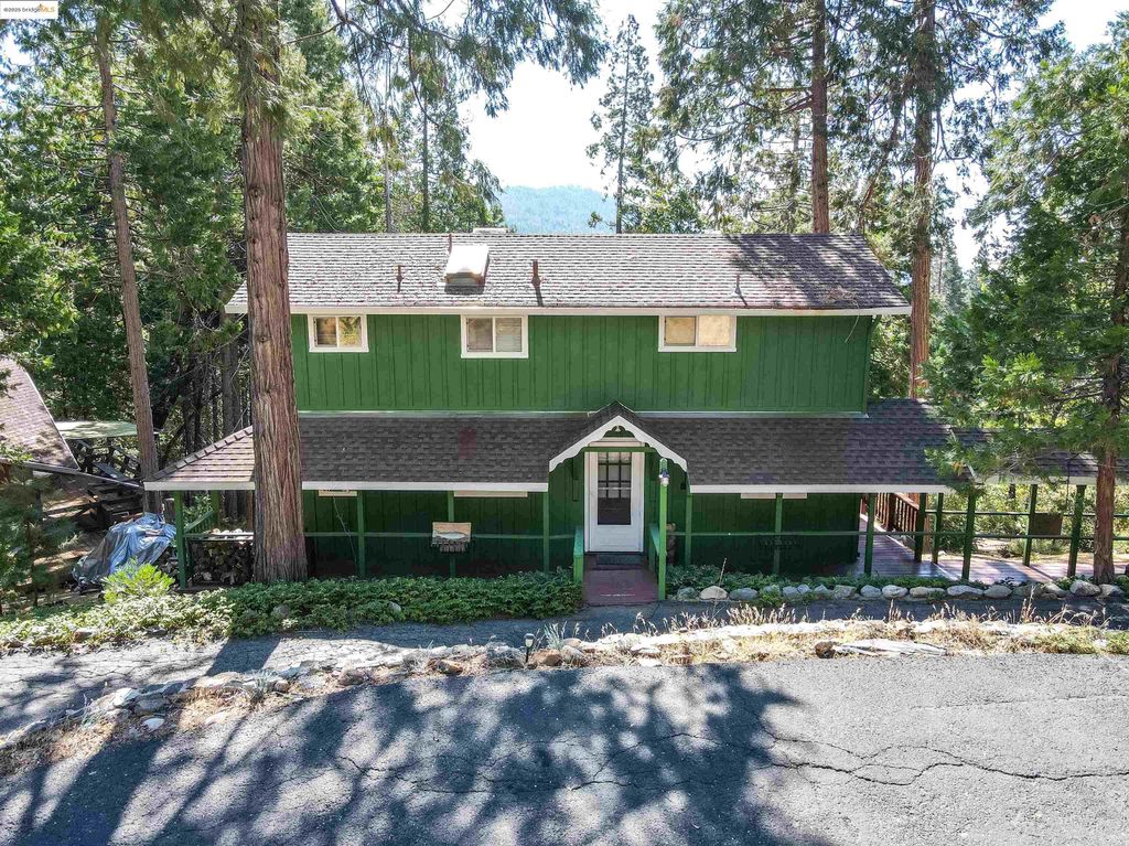 Photo of 20737 Muheli Rd, Mi Wuk Village, CA 95346 (MLS # 41113327)