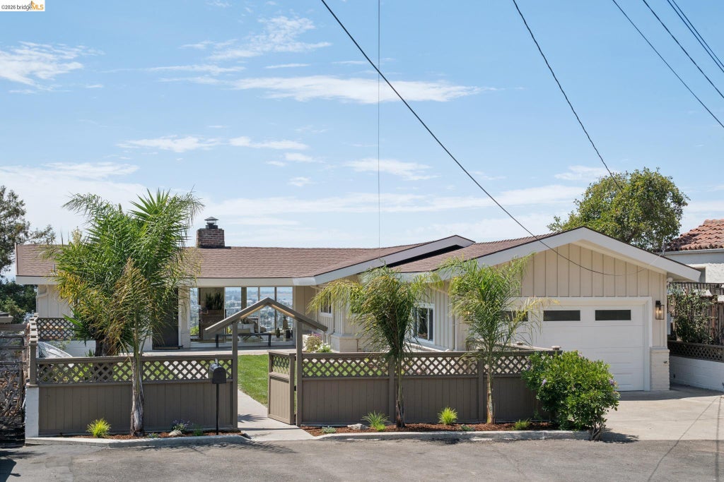 Photo of 7425 Hillmont Drive, Oakland, CA 94605 (MLS # 41145897)