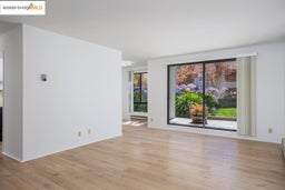 Spare room with light wood-style flooring and baseboards