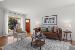 Living area featuring hardwood / wood-style flooring
