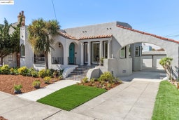 Mediterranean / spanish-style house featuring stucco siding and a tiled roof