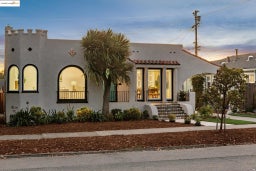 Mediterranean / spanish house featuring stucco siding