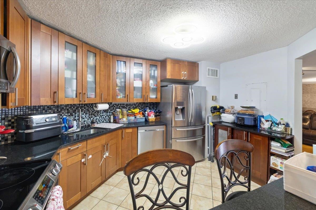 2208 HARMON COVE TOWER