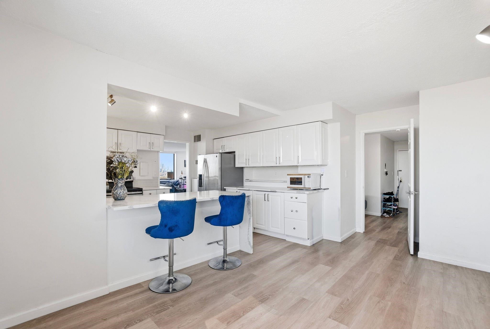 1633 HARMON COVE TOWER 1633