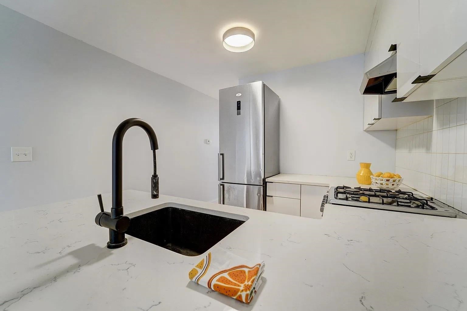 57 MONITOR ST 1