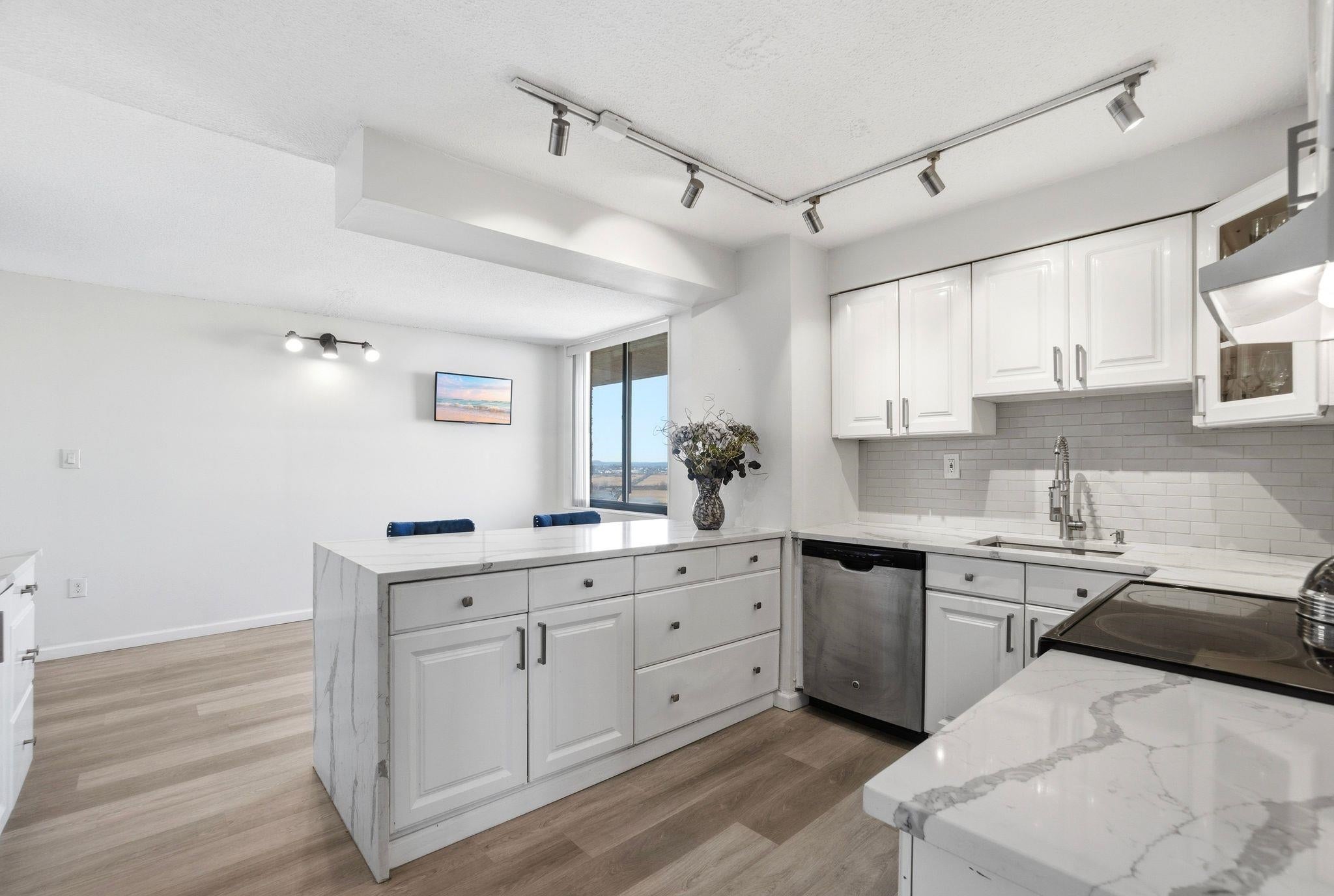 1633 HARMON COVE TOWER 1633