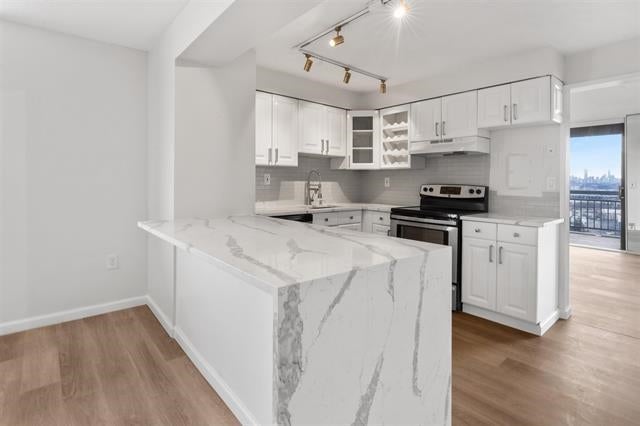 1633 HARMON COVE TOWER 1633