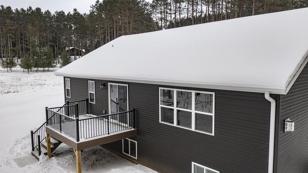 Photo of N3405 Covered Bridge ROAD, Waupaca, WI 54981 (MLS # 50319214)