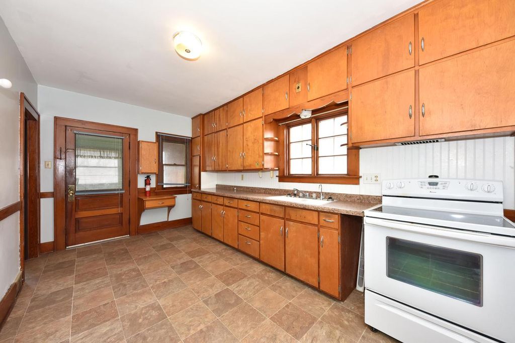 Photo of 451 W Kilbourn AVENUE, West Bend, WI 53095 (MLS # 1953802)