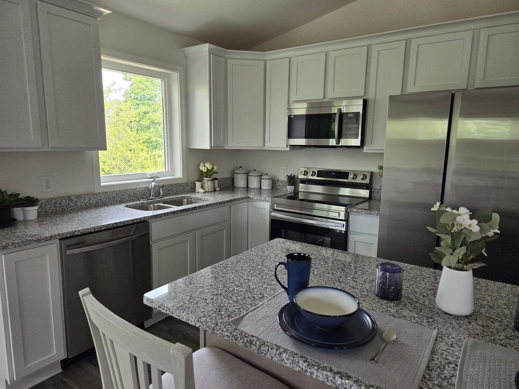 Photo of 41 Rock River DRIVE, Edgerton, WI 53589 (MLS # 2026132)